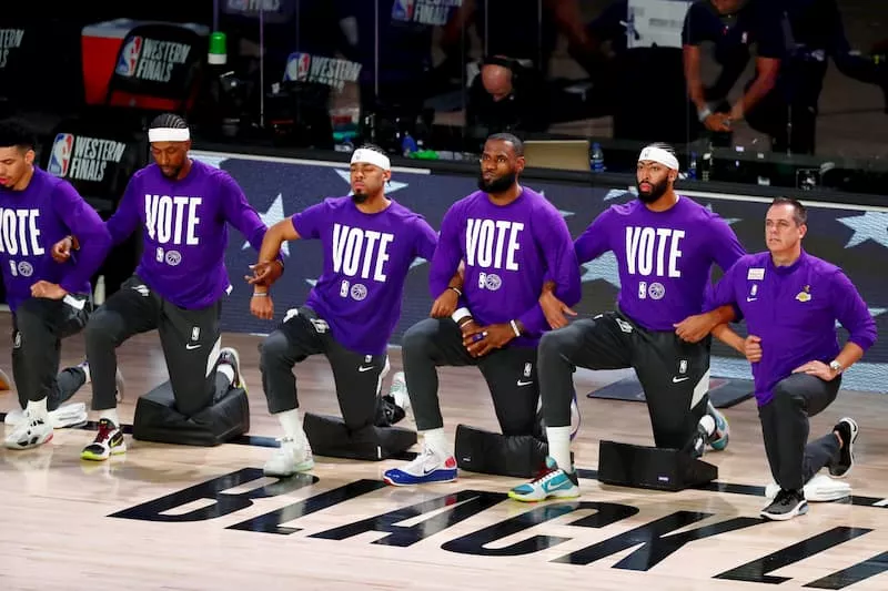 Los Angeles Lakers take a knee